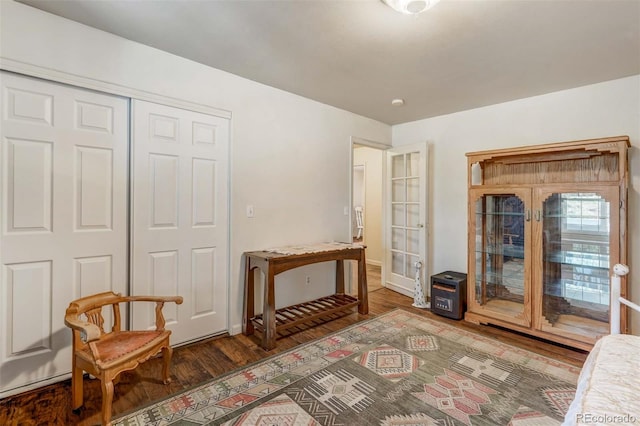 sitting room with wood-type flooring and french doors