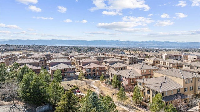 bird's eye view featuring a mountain view and a residential view