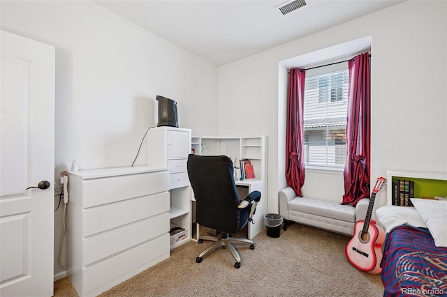 home office featuring visible vents and light colored carpet