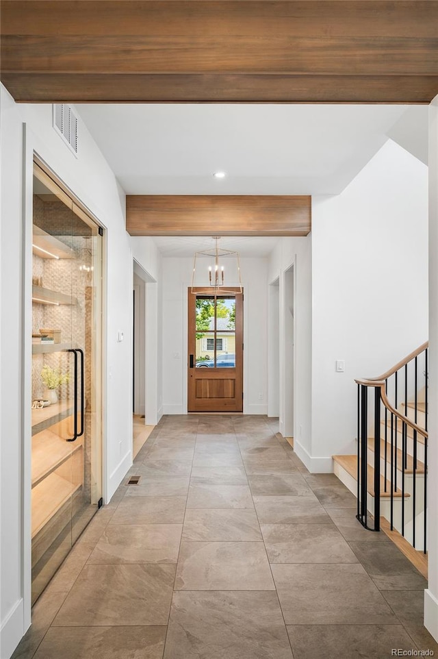 interior space featuring an inviting chandelier