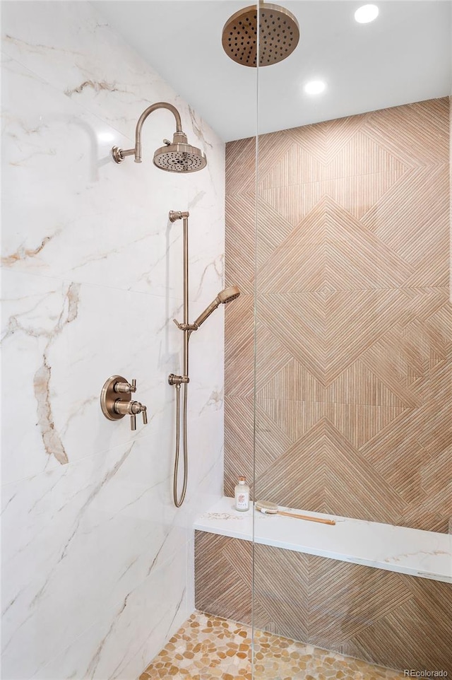 bathroom featuring tiled shower