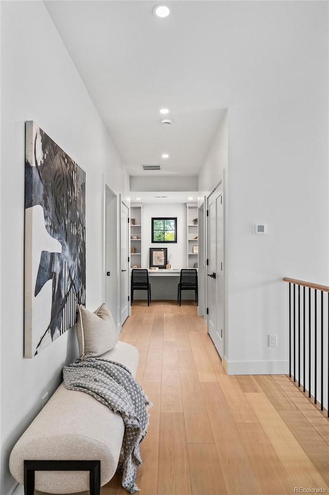 hall featuring light hardwood / wood-style flooring