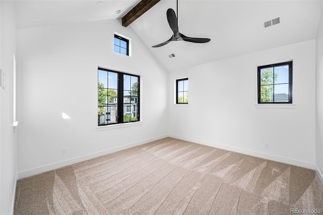 carpeted empty room featuring beam ceiling, french doors, high vaulted ceiling, and ceiling fan