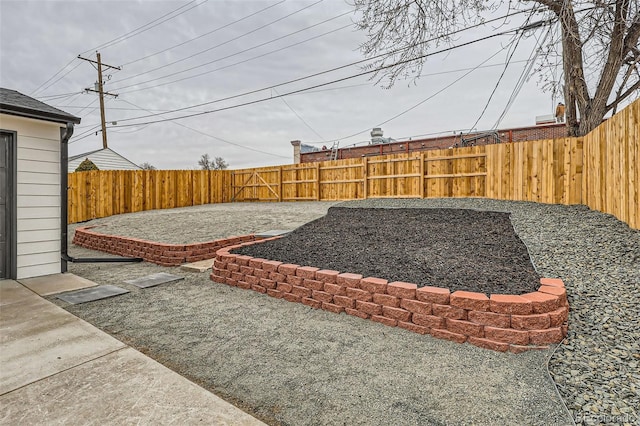 1120 Xenia St, Denver, CO 80220 - view of yard featuring a fenced backyard and a patio