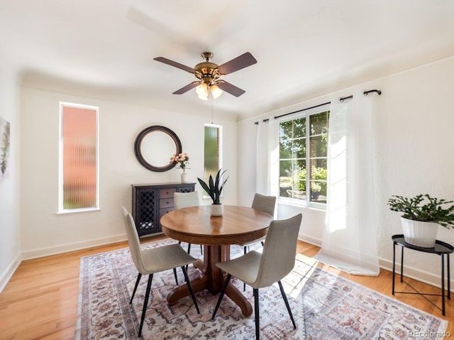 1470 Utica St, Denver, CO 80204 - dining room featuring light wood-style floors and ceiling fan