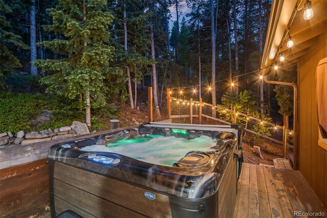 375 Castlewood Dr, Evergreen, CO 80439 - wooden terrace with a hot tub