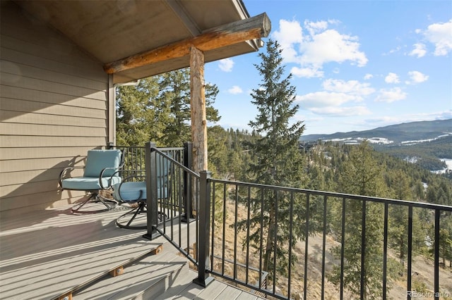 balcony featuring a mountain view