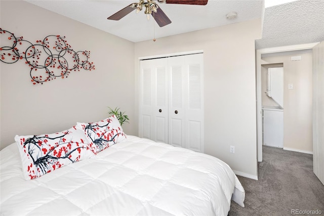 bedroom with a textured ceiling, ceiling fan, a closet, and light colored carpet