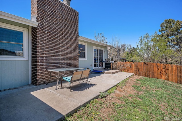 view of yard featuring a patio area and fence