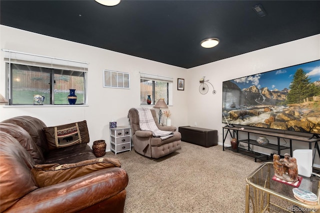 carpeted living room with visible vents