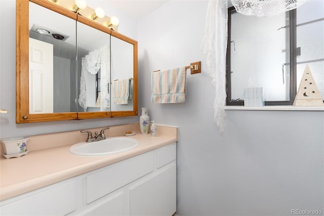 bathroom featuring vanity