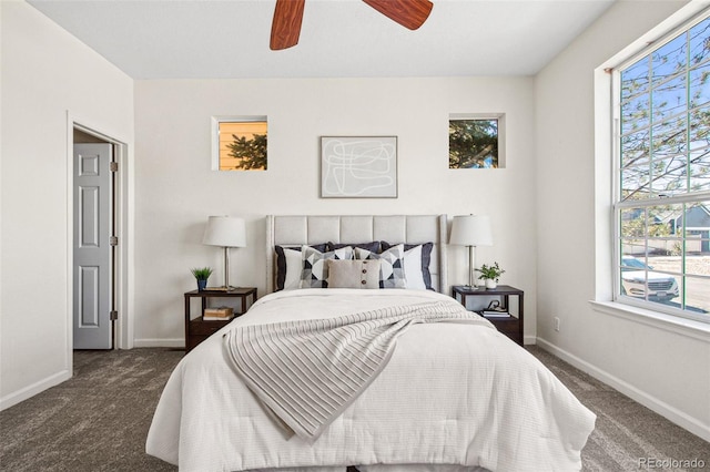 bedroom with carpet floors, ceiling fan, and baseboards