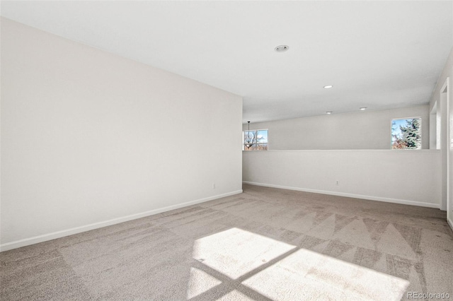 unfurnished room featuring carpet floors, recessed lighting, and baseboards