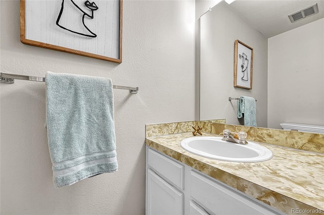 5543 S Kenton Ct, Englewood, CO 80111 - bathroom featuring vanity and toilet