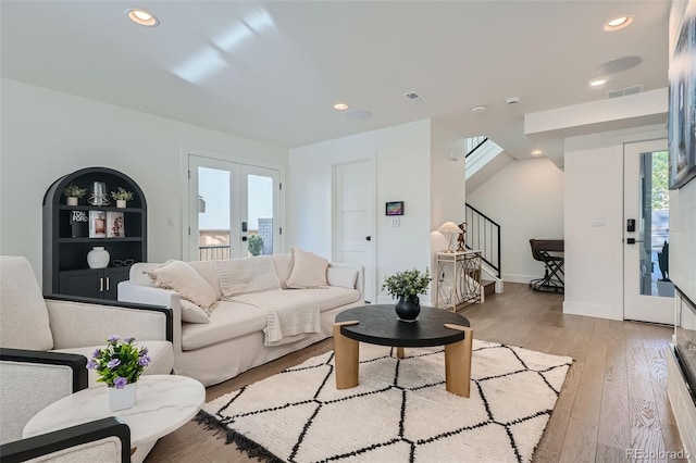 living room with light hardwood / wood-style floors