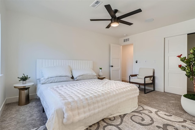 bedroom with ceiling fan and carpet