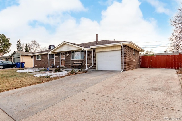 ranch-style house featuring a garage