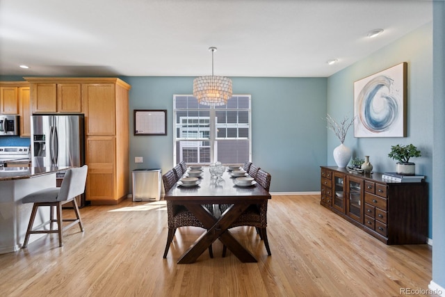 4515 W 107th Cir, Westminster, CO 80031 - dining space with a chandelier, light wood finished floors, and recessed lighting