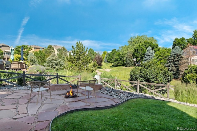 4515 W 107th Cir, Westminster, CO 80031 - view of yard with a fire pit and a patio