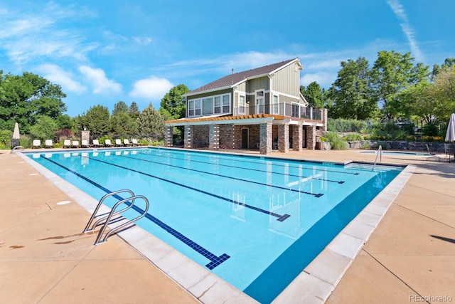 4515 W 107th Cir, Westminster, CO 80031 - community pool featuring a patio area