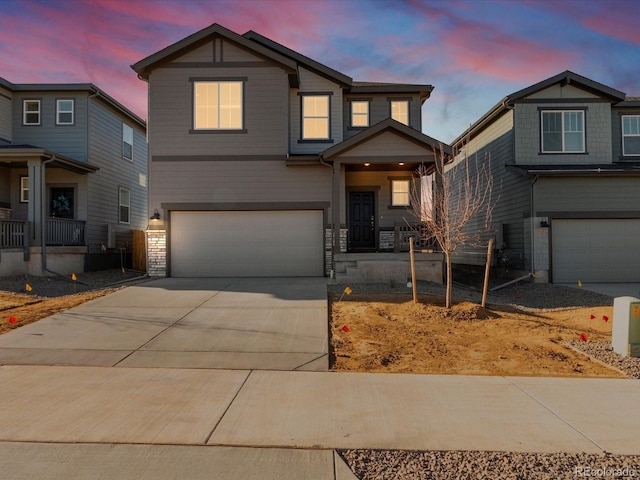 view of front of property featuring a garage