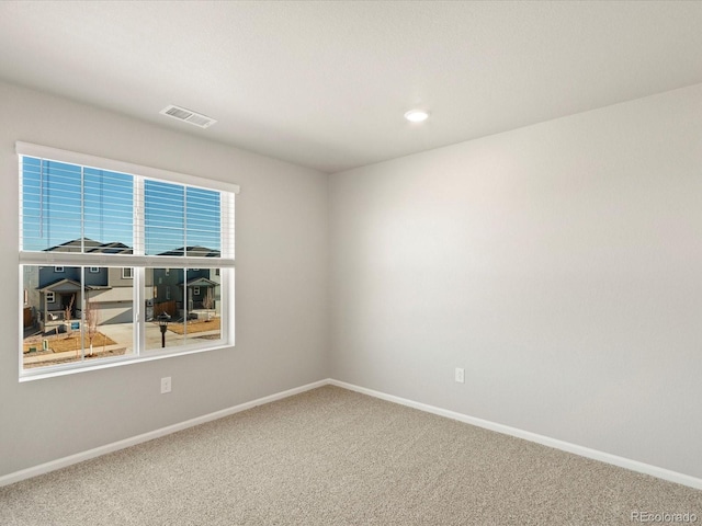 view of carpeted spare room