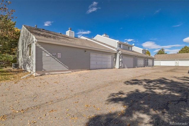 garage featuring central air condition unit