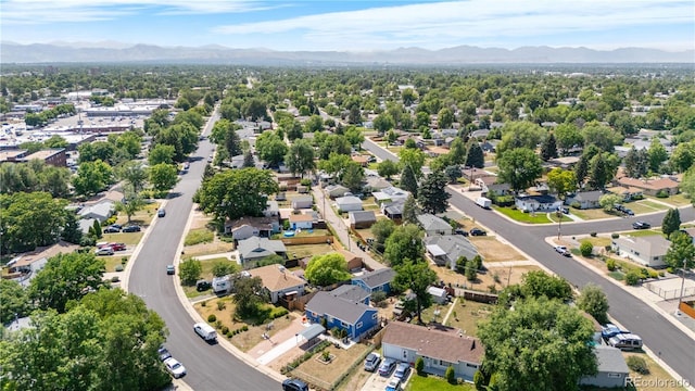 935 S Pecos Way, Denver, CO 80223 - aerial perspective of suburban area featuring a mountain backdrop
