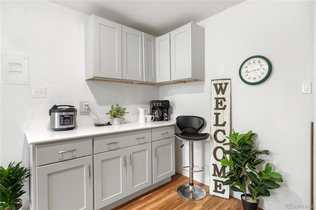 935 S Pecos Way, Denver, CO 80223 - kitchen featuring light countertops and light wood-style flooring