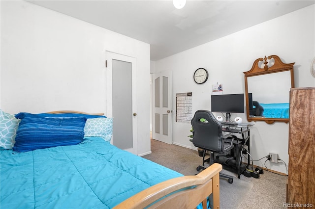 935 S Pecos Way, Denver, CO 80223 - bedroom featuring carpet flooring and a desk
