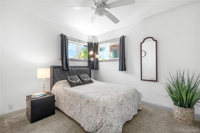 935 S Pecos Way, Denver, CO 80223 - bedroom featuring carpet and a ceiling fan