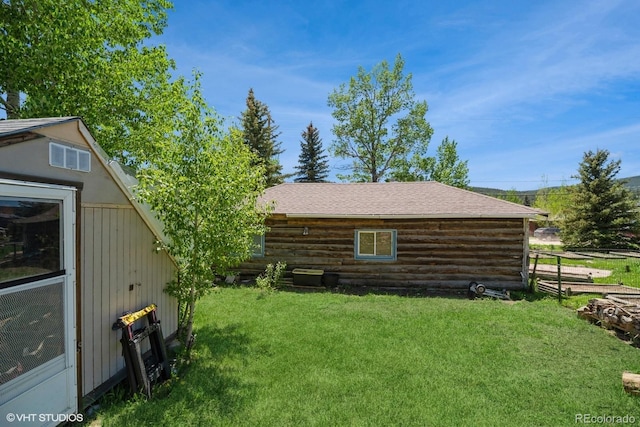 view of home's exterior featuring a lawn