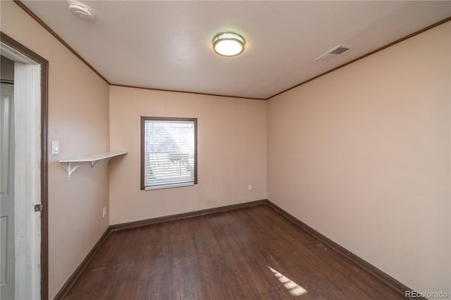 empty room featuring dark hardwood / wood-style floors