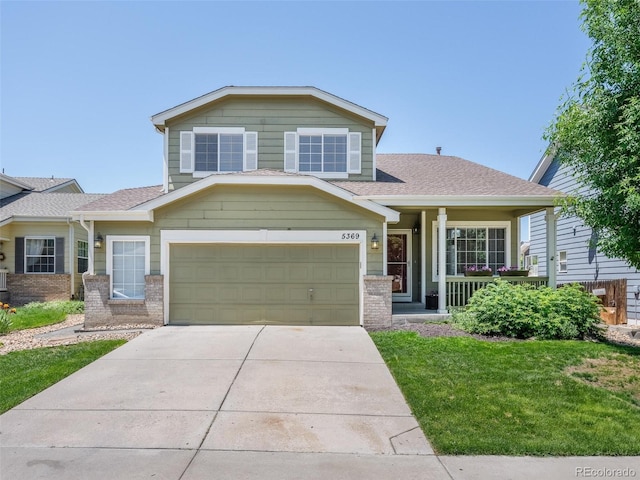 5369 Creek Way, Parker, CO 80134 - view of front of home featuring brick siding, concrete driveway, a garage, a front yard, and a shingled roof