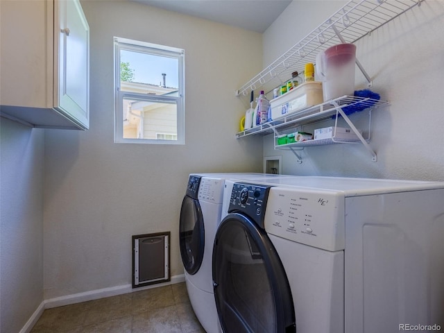 5369 Creek Way, Parker, CO 80134 - laundry room with washer and clothes dryer, cabinet space, baseboards, and tile patterned flooring