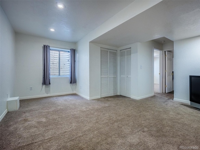 5369 Creek Way, Parker, CO 80134 - unfurnished living room with carpet, baseboards, and recessed lighting