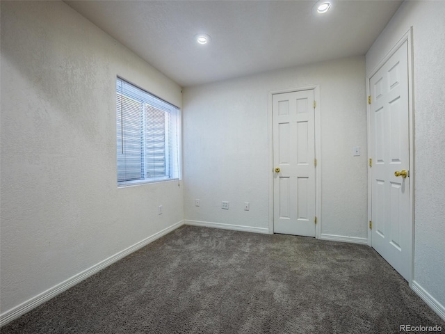 5369 Creek Way, Parker, CO 80134 - unfurnished bedroom with carpet, baseboards, and recessed lighting