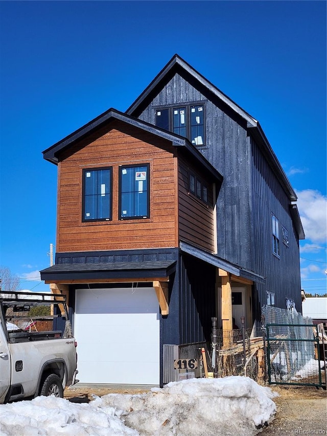 116 E 13th St, Leadville, CO 80461 - contemporary house featuring fence and an attached garage