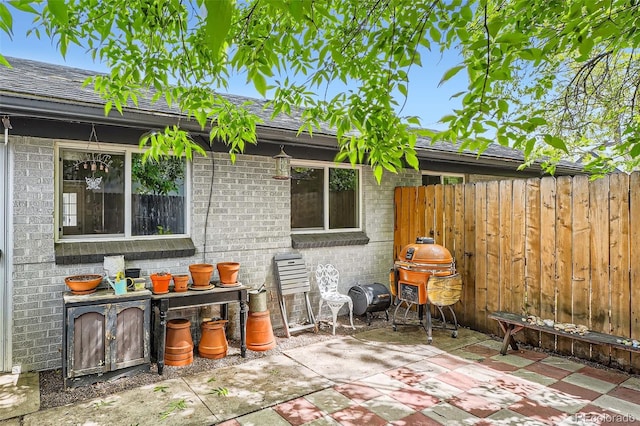 view of patio / terrace with fence