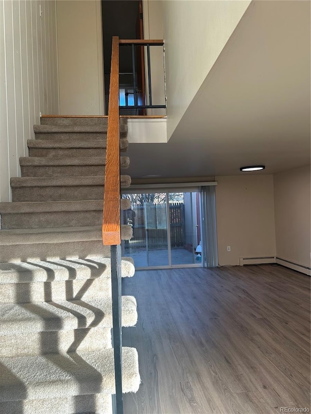 8682 W 51st Ave, Arvada, CO 80002 - stairway featuring wood finished floors