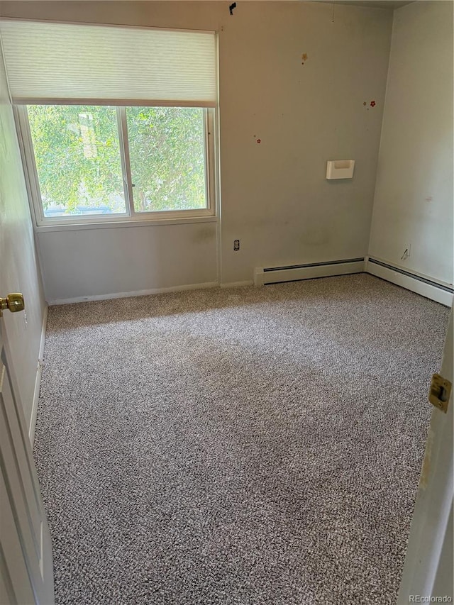 8682 W 51st Ave, Arvada, CO 80002 - spare room with baseboards and carpet flooring