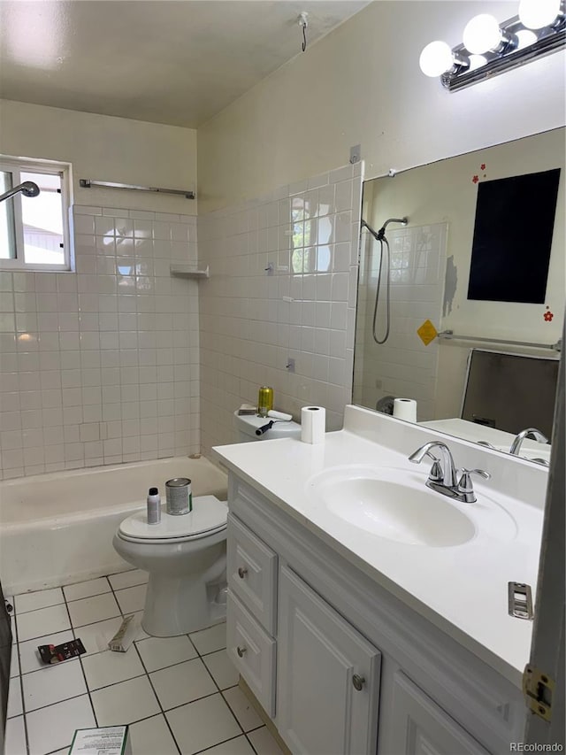 8682 W 51st Ave, Arvada, CO 80002 - full bath featuring tile patterned flooring, vanity, and tub / shower combination