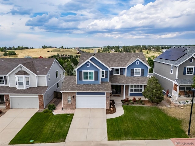 20339 Vista Cir, Parker, CO 80138 - traditional-style house with concrete driveway, a garage, brick siding, and a front yard