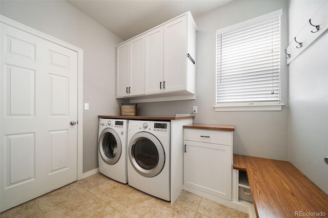 20339 Vista Cir, Parker, CO 80138 - washroom with independent washer and dryer, cabinet space, and light tile patterned flooring