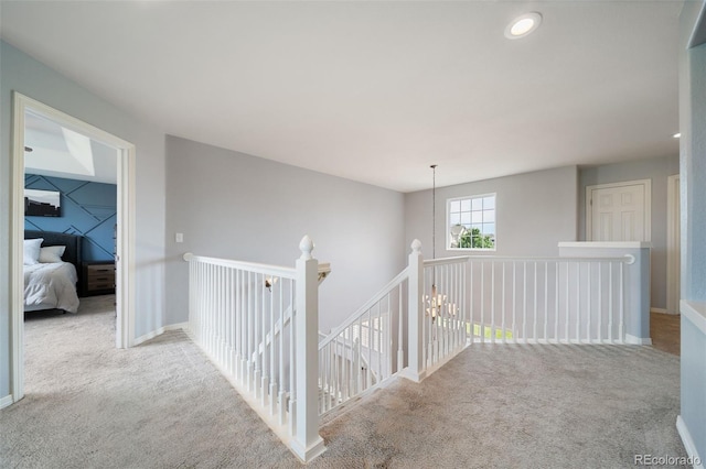20339 Vista Cir, Parker, CO 80138 - corridor with carpet flooring and an upstairs landing