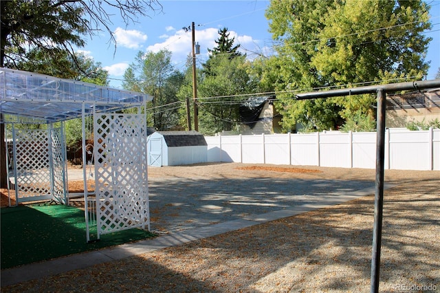 view of patio / terrace with a storage shed