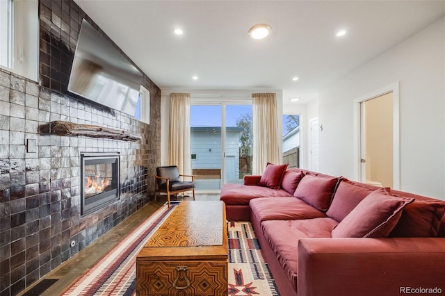 4390 Osage St, Denver, CO 80211 - living room featuring a large fireplace, wood finished floors, and recessed lighting