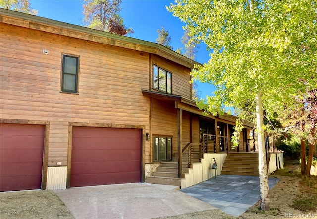 900 Tallaqua Dr, Grand Lake, CO 80447 - view of front of home with driveway and an attached garage