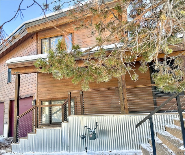 900 Tallaqua Dr, Grand Lake, CO 80447 - view of side of property featuring a garage