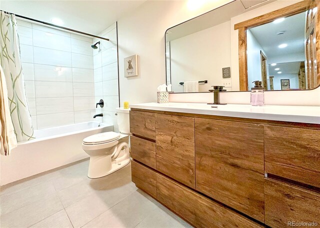 900 Tallaqua Dr, Grand Lake, CO 80447 - full bath with shower / bath combo with shower curtain, toilet, vanity, and tile patterned flooring